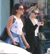 Lea Michele and Emma Roberts arriving at Sugarfish restaurant in Beverly Hills (January 31, 2017)
