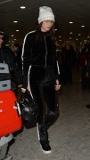 Bella Hadid &  Hailey Baldwin - at Heathrow Airport, in London 02/18/ 2017
