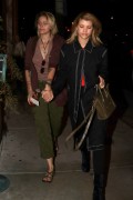 Paris Jackson and Sofia Richie hold hands as they arrive at Catch in West Hollywood 03.03.2017