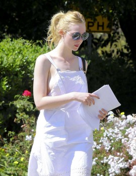 Elle Fanning Nipple Wardrobe Malfunction in White Dress - UpskirtSTARS